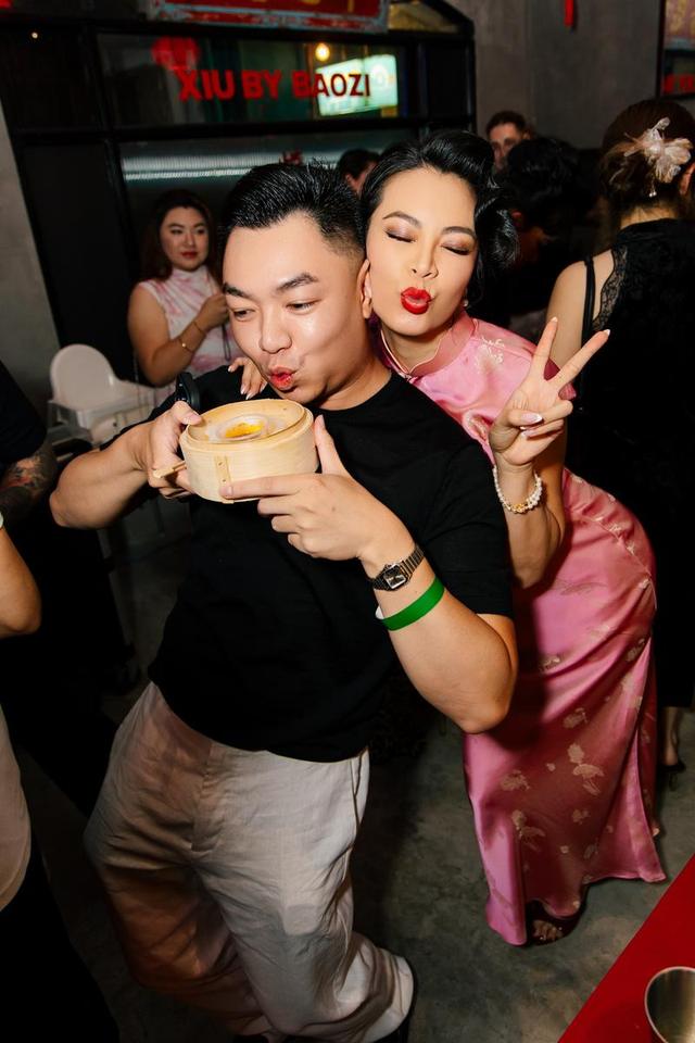 Two guests hamming it up with a bamboo steamer at Dim Sum Disco